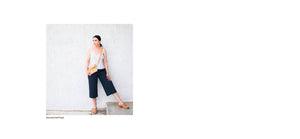 Got the Scoop Tank in Cloud colored technical silk with bonded hems and a v-shaped neckline