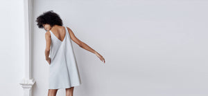 A-line, technical wrap dress with a V-neck and adjustable, removable belt. Technical apparel by ADAY, perfect for travel.