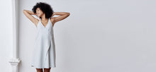 A-line, technical wrap dress with a V-neck and adjustable, removable belt. Technical apparel by ADAY, perfect for travel.