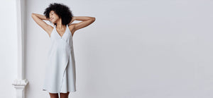 A-line, technical wrap dress with a V-neck and adjustable, removable belt. Technical apparel by ADAY, perfect for travel.