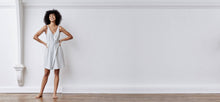 A-line, technical wrap dress with a V-neck and adjustable, removable belt. Technical apparel by ADAY, perfect for travel.