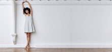 A-line, technical wrap dress with a V-neck and adjustable, removable belt. Technical apparel by ADAY, perfect for travel.