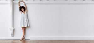 A-line, technical wrap dress with a V-neck and adjustable, removable belt. Technical apparel by ADAY, perfect for travel.