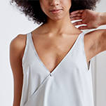 A-line, technical wrap dress with a V-neck and adjustable, removable belt. Technical apparel by ADAY, perfect for travel.