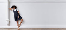 A-line, technical wrap dress with a V-neck and adjustable, removable belt. Technical apparel by ADAY, perfect for travel.