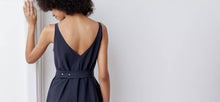 A-line, technical wrap dress with a V-neck and adjustable, removable belt. Technical apparel by ADAY, perfect for travel.