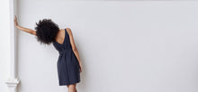 A-line, technical wrap dress with a V-neck and adjustable, removable belt. Technical apparel by ADAY, perfect for travel.