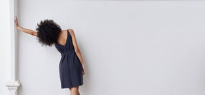 A-line, technical wrap dress with a V-neck and adjustable, removable belt. Technical apparel by ADAY, perfect for travel.