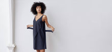 A-line, technical wrap dress with a V-neck and adjustable, removable belt. Technical apparel by ADAY, perfect for travel.