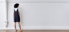 A-line, technical wrap dress with a V-neck and adjustable, removable belt. Technical apparel by ADAY, perfect for travel.