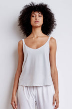 Technical silk camisole with adjustable straps, perfect for travel. Designed by ADAY