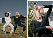 V neck style technical long sleeve top with cuffed sleeves and back pleat. Technical apparel by ADAY, perfect for travel.