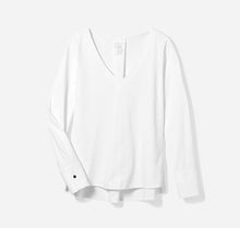 V neck style technical long sleeve top with cuffed sleeves and back pleat. Technical apparel by ADAY, perfect for travel.