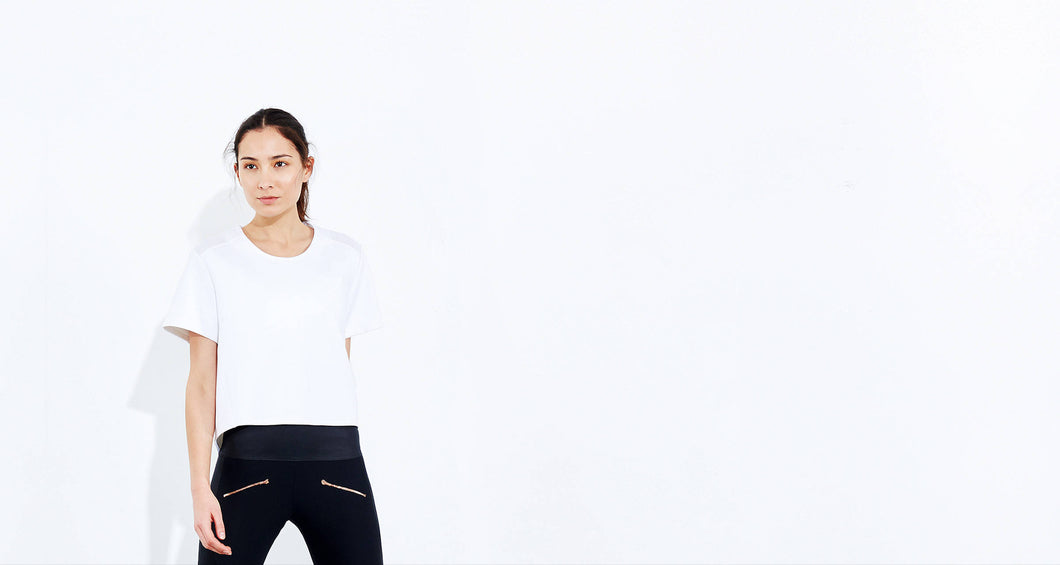 ADAY white neoprene top with mesh panel fashion activewear