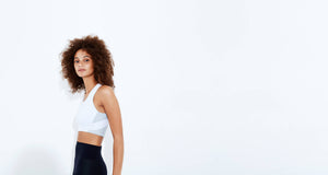 High impact minimal sports bra with bonded straps and a long front body