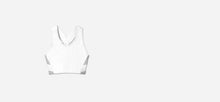 High impact minimal sports bra with bonded straps and a long front body