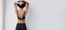 Statement medium impact sports bra in shadow by ADAY