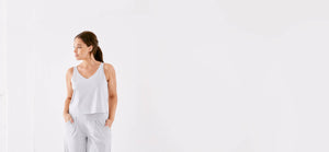 Got the Scoop Tank in Cloud colored technical silk with bonded hems and a v-shaped neckline