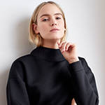 Black technical modal sweatshirt with laser cut bonded collar and vented back panel by ADAY