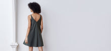 A-line, technical wrap dress with a V-neck and adjustable, removable belt. Technical apparel by ADAY, perfect for travel.