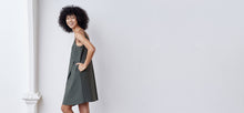 A-line, technical wrap dress with a V-neck and adjustable, removable belt. Technical apparel by ADAY, perfect for travel.