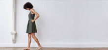 A-line, technical wrap dress with a V-neck and adjustable, removable belt. Technical apparel by ADAY, perfect for travel.
