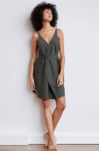 A-line, technical wrap dress with a V-neck and adjustable, removable belt. Technical apparel by ADAY, perfect for travel.