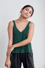 A-line tank top with a v-neck and v-back, bonded hem and lower arm holes. Super soft to touch, made from a plant based fiber.