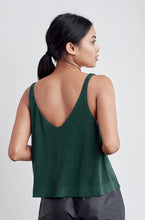 A-line tank top with a v-neck and v-back, bonded hem and lower arm holes. Super soft to touch, made from a plant based fiber.