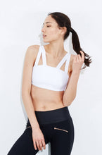 White statement bonded sports bra with compression fabric