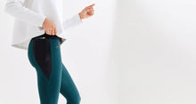 technical leggings with bonded seams, gunmetal zippers + a side phone pocket