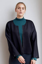 Recycled, reversible kimono sleeve jacket with gunmetal zip and adjustable arms.