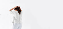Cloud colored, recycled, reversible kimono style scuba jacket made from 41 recycled water bottles.