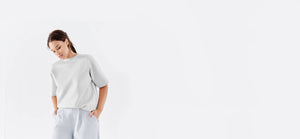 Cloud colored, recycled, reversible kimono style scuba jacket made from 41 recycled water bottles.