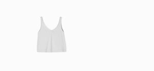 Got the Scoop Tank in Cloud colored technical silk with bonded hems and a v-shaped neckline