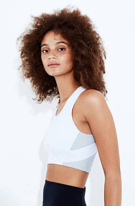 High impact minimal sports bra with bonded straps and a long front body