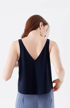 Got the Scoop Tank in technical silk with bonded hems and a v-shaped neckline