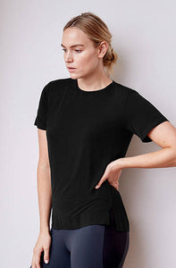 Oversized, boxy t-shirt with bonded hem and sleeves and sewn crew neck. Made from super soft plant-based fibers.