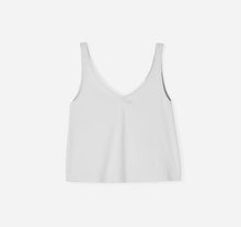 Got the Scoop Tank in Cloud colored technical silk with bonded hems and a v-shaped neckline