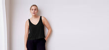 A-line tank top with a v-neck and v-back, bonded hem and lower arm holes. Super soft to touch, made from a plant based fiber.