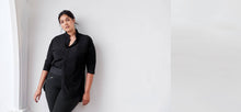 Black colored technical leggings with bonded seams, gunmetal zippers + a side phone pocket