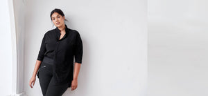 Black colored technical leggings with bonded seams, gunmetal zippers + a side phone pocket