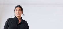 Technical button down shirt with side slits, bonded seams + gunmetal snaps
