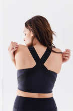 High impact minimal sports bra with bonded straps and a long front body