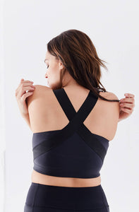 High impact minimal sports bra with bonded straps and a long front body