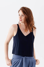 Got the Scoop Tank in Cloud  colored technical silk with bonded hems and a v-shaped neckline