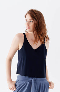 Got the Scoop Tank in Cloud  colored technical silk with bonded hems and a v-shaped neckline